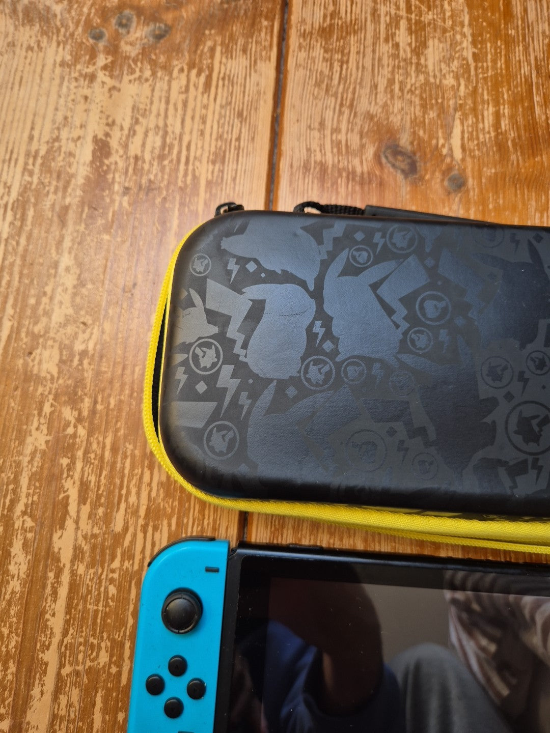 Nintendo Switch With Grip, Charger Cable And Pokemon Carry Case