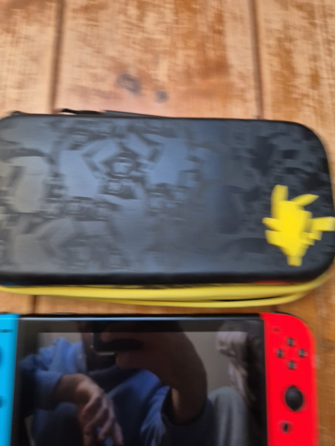 Nintendo Switch With Grip, Charger Cable And Pokemon Carry Case