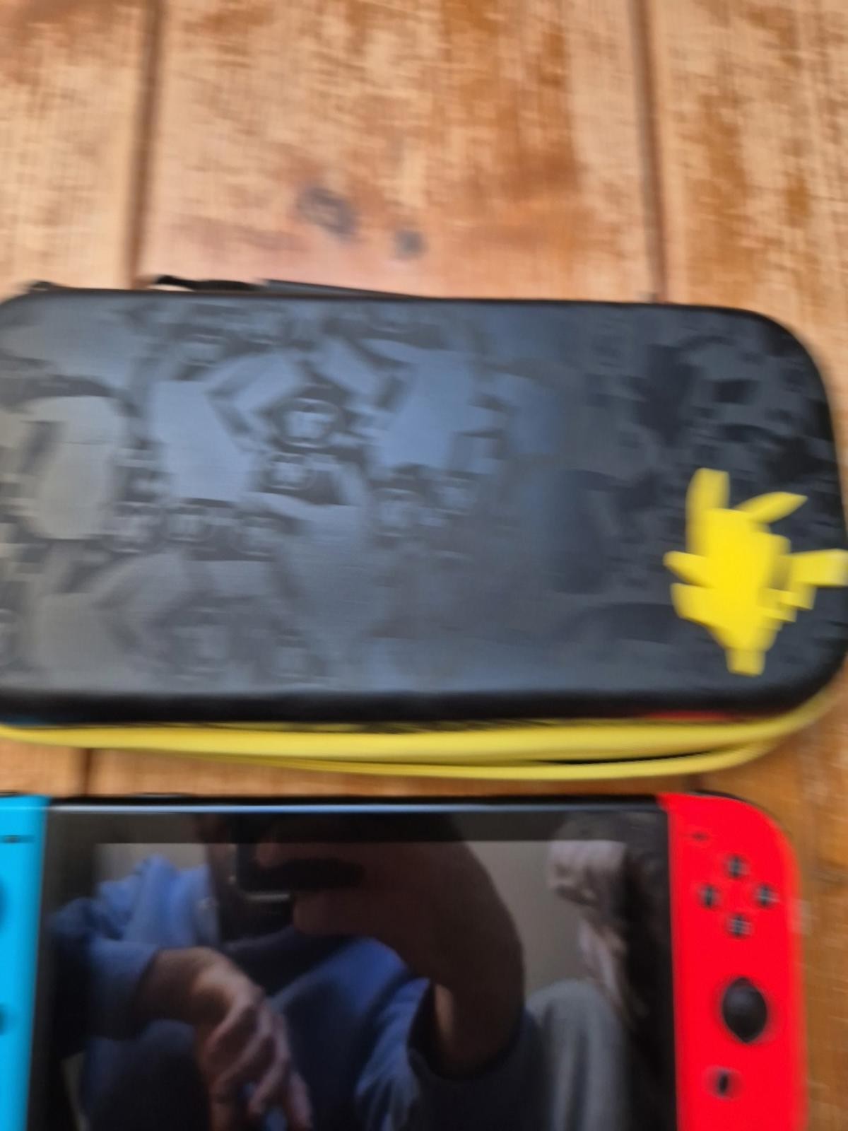 Nintendo Switch With Grip, Charger Cable And Pokemon Carry Case