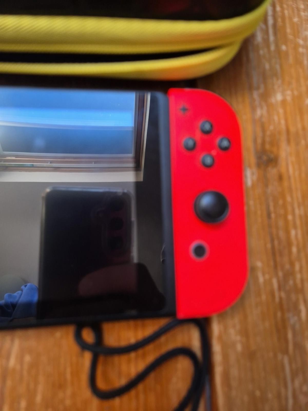 Nintendo Switch With Grip, Charger Cable And Pokemon Carry Case