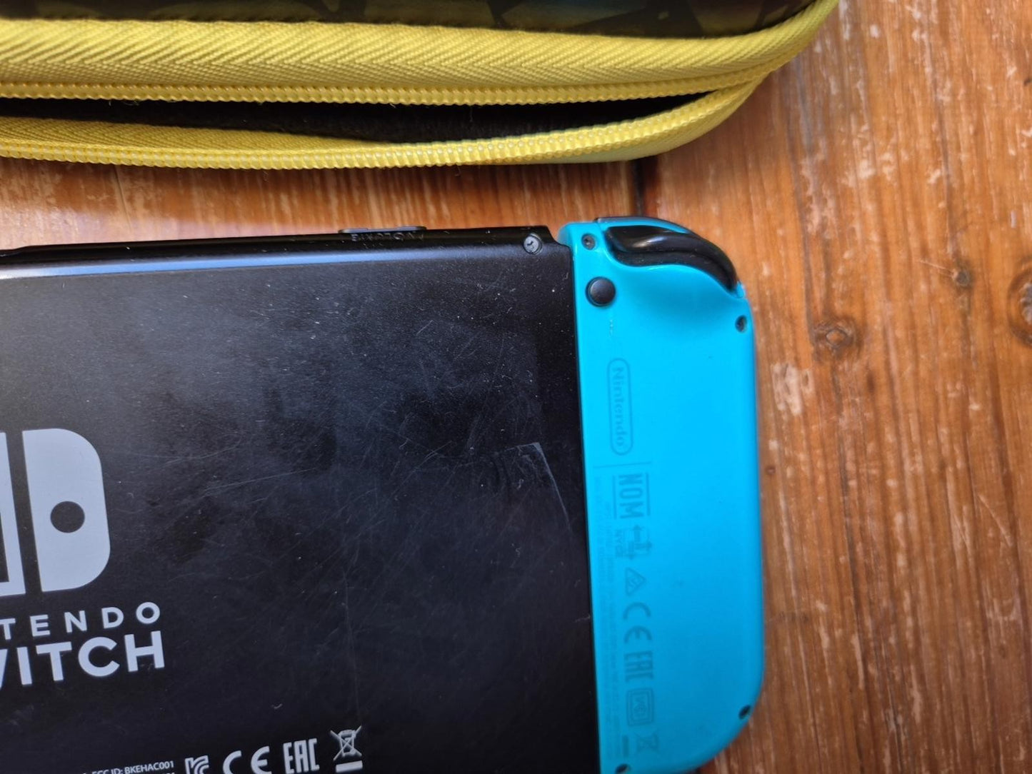 Nintendo Switch With Grip, Charger Cable And Pokemon Carry Case